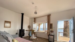 Habitación superior con 1 cama doble o 2 individuales | Zona de estar