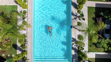 Outdoor pool, pool umbrellas, pool loungers