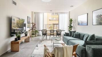 Apartment | Living area | 75-inch Smart TV with digital channels, TV