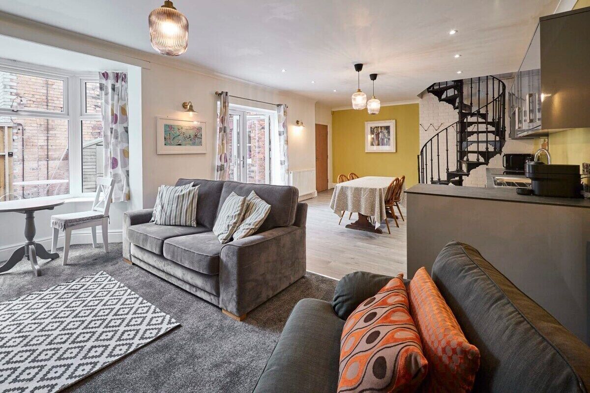 TV, fireplace, books, offices