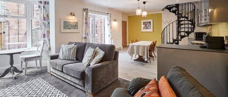 TV, fireplace, books, offices