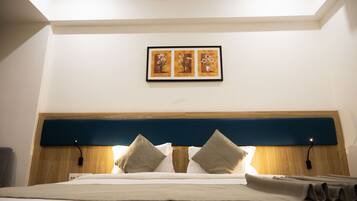 Comfort Room, 1 Bedroom | 1 bedroom, pillowtop beds, iron/ironing board, free WiFi