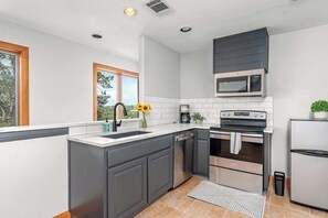 Fridge, microwave, oven, stovetop - Lake Park House: Luxury Retreat Sleeps 23 w/Pool (Dripping Springs)