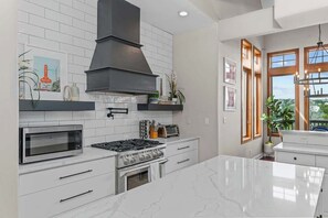 Fridge, microwave, oven, stovetop - Lake Park House: Luxury Retreat Sleeps 23 w/Pool (Dripping Springs)