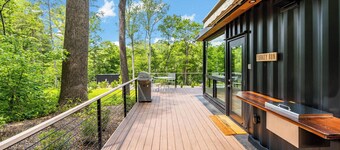 Cute Riverside Cabin w Hot Tub, Fire Pit, & Kayaks