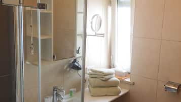 Hair dryer, towels, soap, shampoo