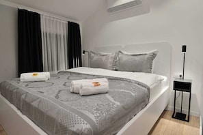 1 chambre, rideaux occultants, fer et planche à repasser, Wi-Fi gratuit