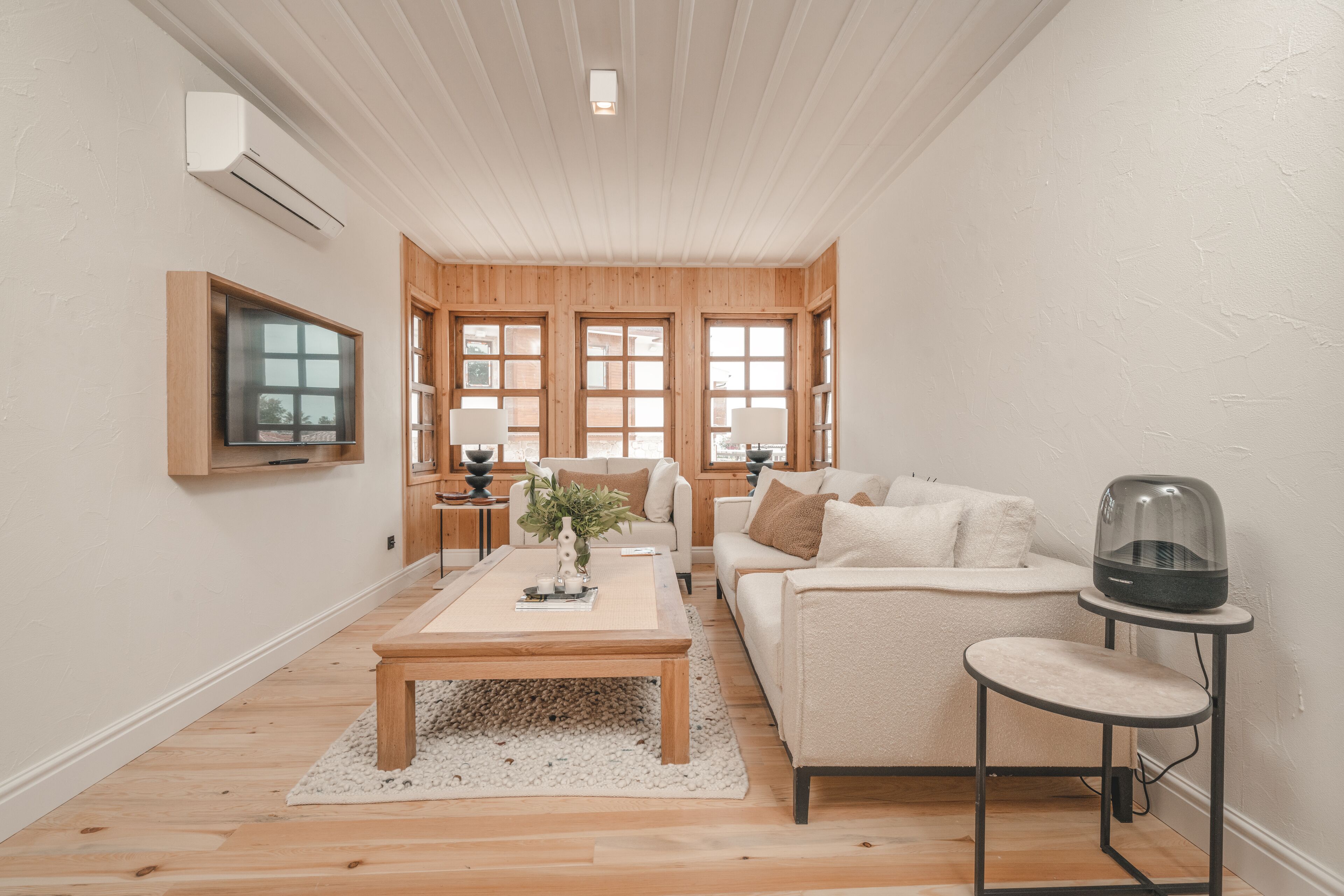 Family Quadruple Room, Multiple Beds | Living area | Flat-screen TV, smart speakers