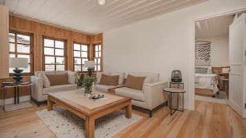 Family Quadruple Room, Multiple Beds | Living area | Flat-screen TV, smart speakers