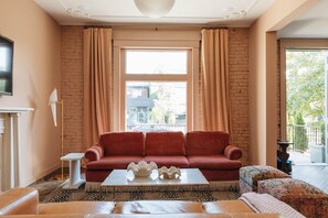 TV, fireplace, books, offices