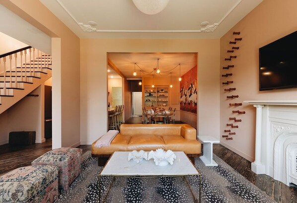 TV, fireplace, books, offices