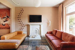 TV, fireplace, books, offices