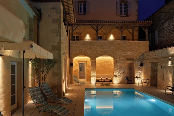 Seasonal outdoor pool, open 9:00 AM to 8:00 PM, pool umbrellas