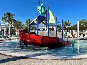 A water play area with a pirate ship structure and a pool. - Frozen | Hero Gameroom | Pool | Near Disney 1806 (Davenport)