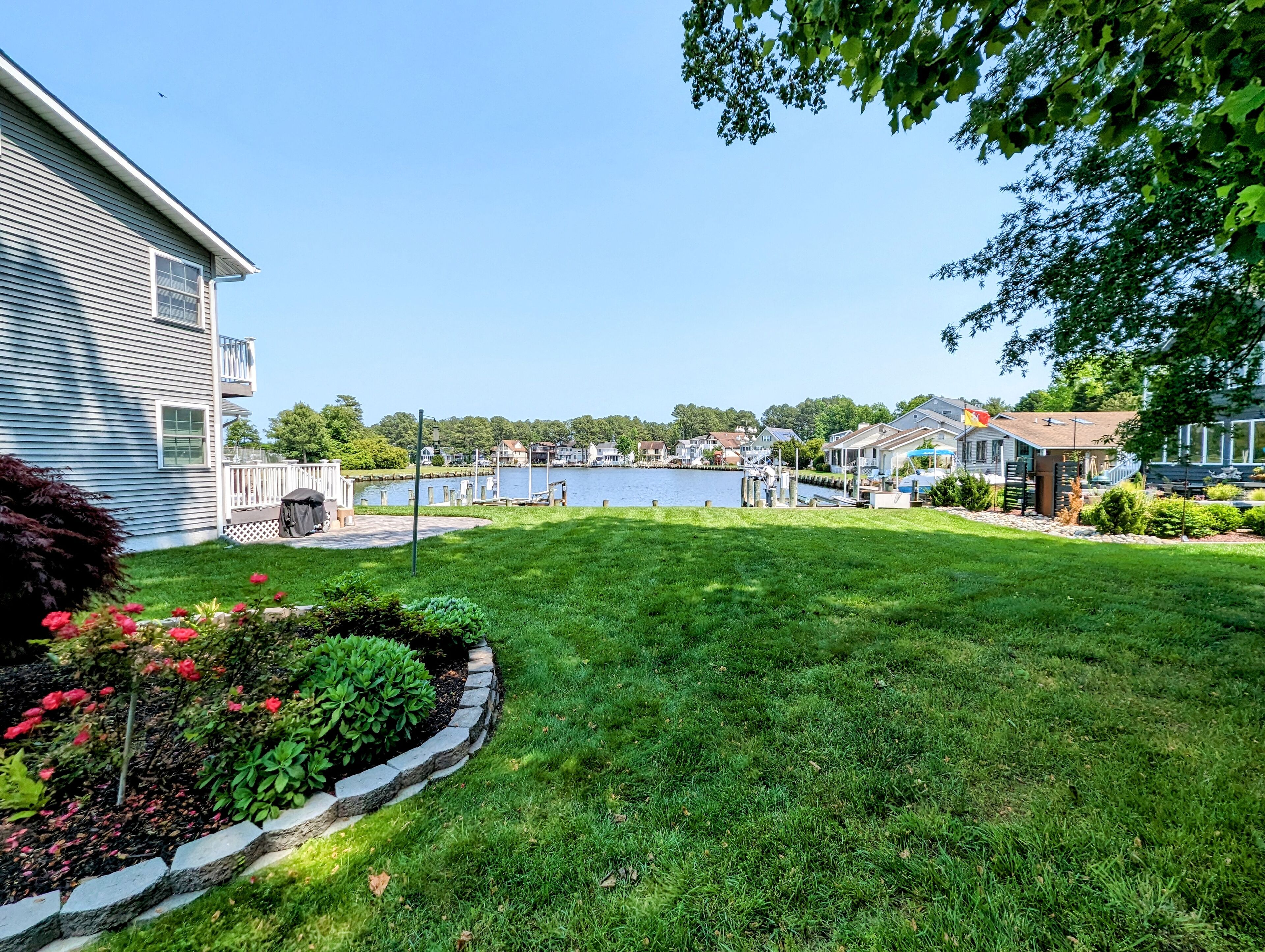 2-story waterfront home with deck, grill, dock, pool, water views, fireplace