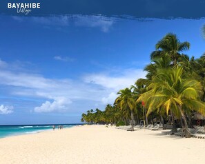 Beach nearby, white sand, sun loungers, beach bar - Tribe Inn & Rooftop Lounge (San Rafael del Yuma)