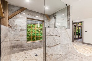 Shower, towels, soap, toilet paper