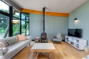 Ferienhaus | Wohnbereich | LCD-Fernseher, Kamin