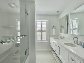 Shower, towels, soap, toilet paper