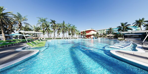 Una piscina al aire libre, camas de piscina con cargo