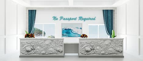 Un área de recepción con un cartel que dice 'No se necesita pasaporte', dos mostradores decorativos con relieves de piedra y una pintura mural de una gran ola.