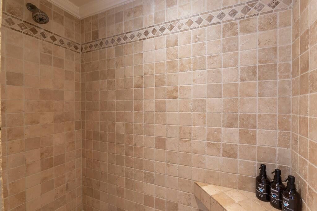 Bathtub, eco-friendly toiletries, hair dryer, towels