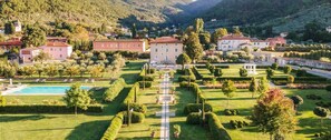 A large estate with a central pathway, multiple buildings, and a swimming pool. - Villa Annabelle - Six Bedroom Villa, Sleeps 18 (Lucca)