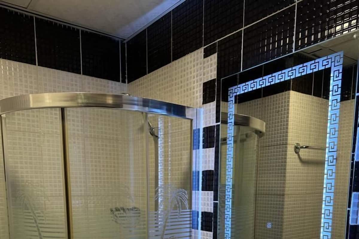 Design Room | Bathroom | Shower, rainfall showerhead, slippers, bidet