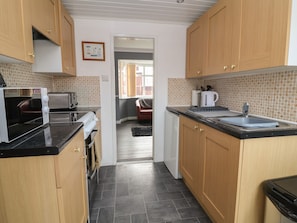 Fridge, electric kettle, toaster, cookware/dishes/utensils