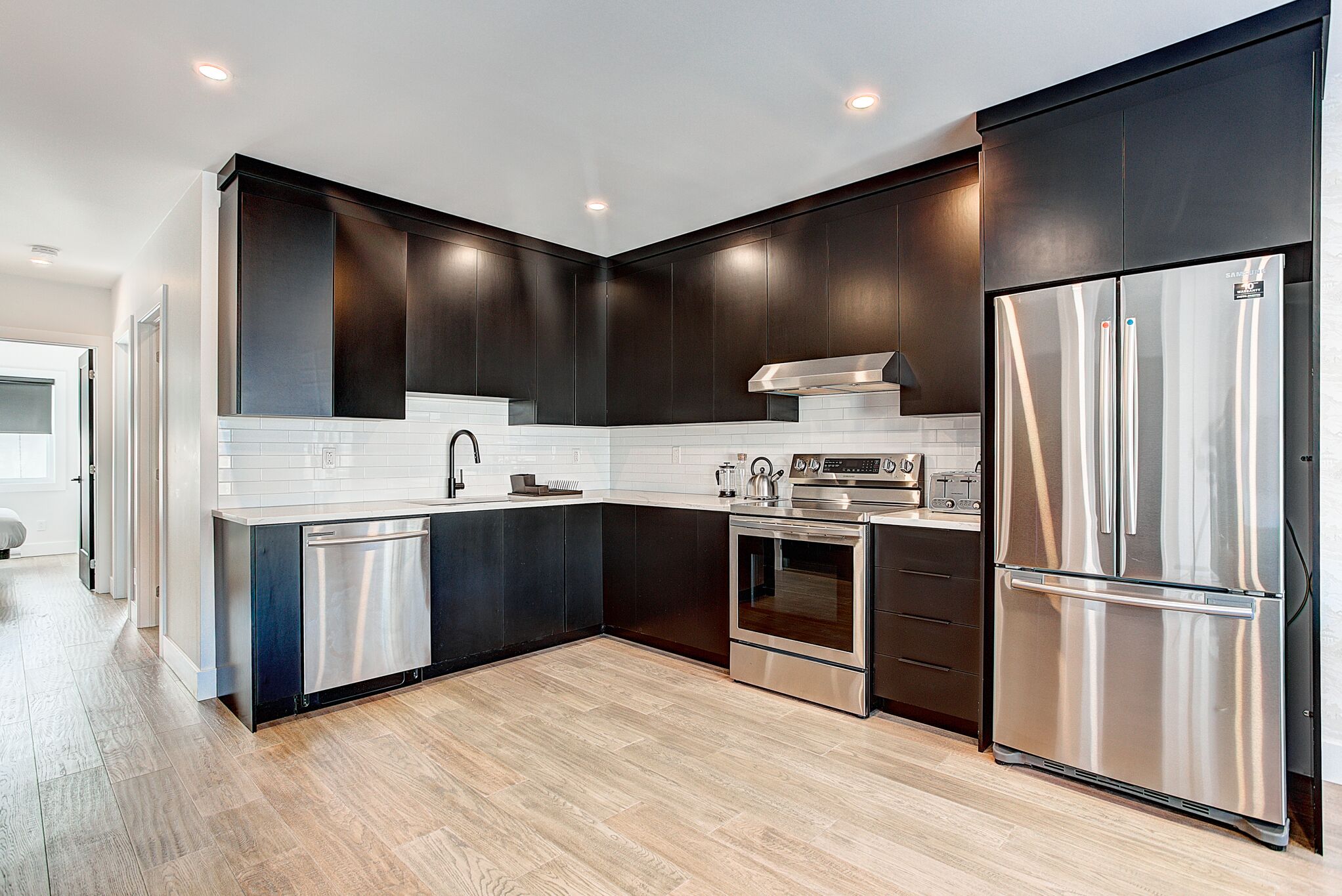 Departamento familiar | Cocina privada | Refrigerador con congelador, microondas, horno y lavavajillas 