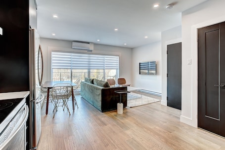 Family Apartment | Living area | 30-inch LCD TV with digital channels, TV