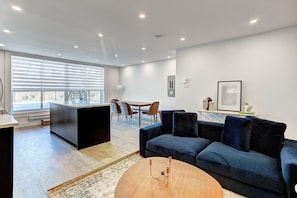 Premium Apartment | Living area | 30-inch LCD TV with digital channels, TV