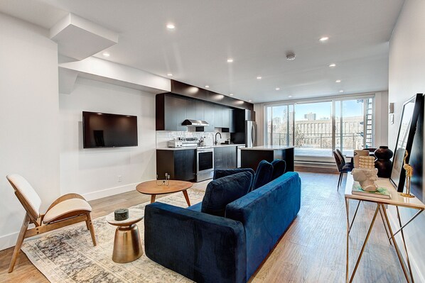 Premium Apartment | Living area | 30-inch LCD TV with digital channels, TV