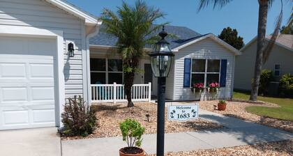 Paradise Village home in perfect golfing and recreation center location.