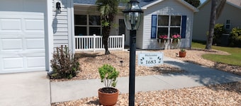 Paradise Village home in perfect golfing and recreation center location.