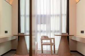 Deluxe Room, 1 King Bed, Non Smoking | Down duvets, in-room safe, desk, blackout curtains