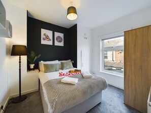 2 bedrooms, desk, iron/ironing board, travel cot