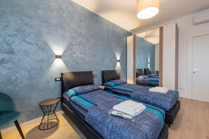 2 habitaciones, tabla de planchar con plancha, wifi y ropa de cama 
