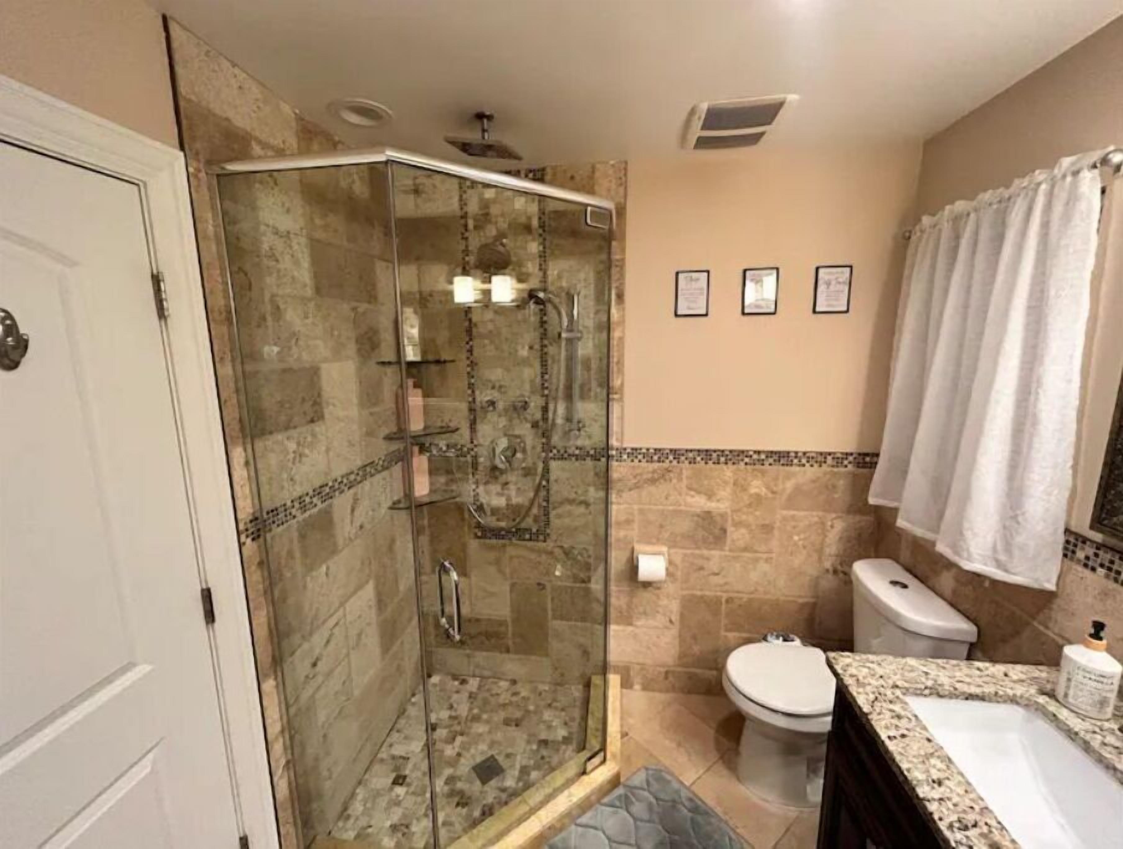 Shower, jetted tub, hair dryer, bidet