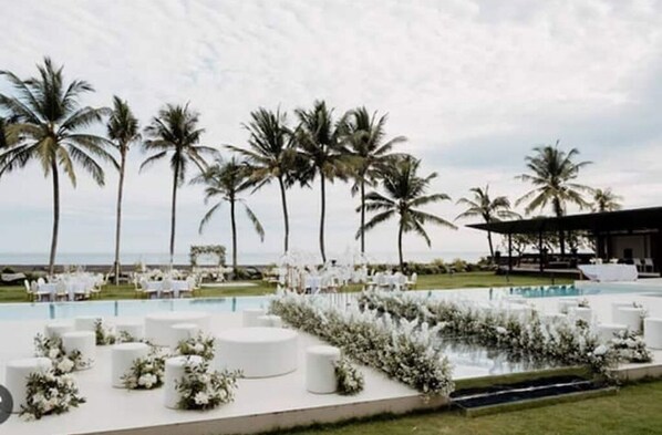 Relax by the pool with ocean views and enjoy the tranquil atmosphere.