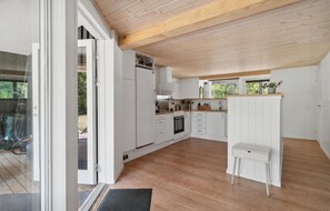 Fridge, stovetop, dishwasher, coffee/tea maker