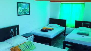 Family Room | Individually furnished, free WiFi, bed sheets