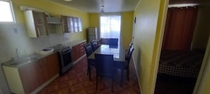 Full-sized fridge, oven, electric kettle, cookware/dishes/utensils