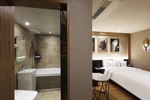 Standard Double Room | Bathroom | Combined shower/tub, designer toiletries, hair dryer, bathrobes