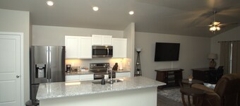 Brand new quiet cozy  furnished home in odessa Midland with TV in each room. 