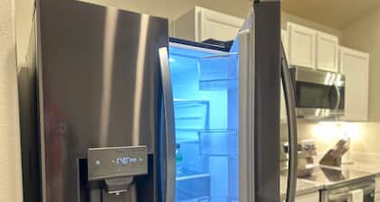 Brand new quiet cozy furnished home in odessa Midland with TV in each room.