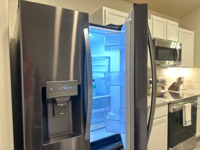 Brand new quiet cozy furnished home in odessa Midland with TV in each room.