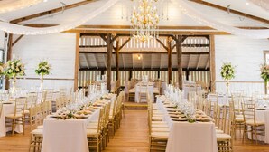 A banquet hall with long tables set for a formal event, featuring a large chandelier and wooden beams. - 7 Bedrooms, 2 Houses all for 1 Price, 5 BR Large House & 2 BR Carriage House (Morgantown)