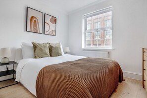 2 slaapkamers, een strijkplank/strijkijzer, wifi, beddengoed