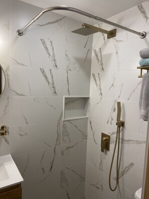 Shower, hair dryer, towels, soap